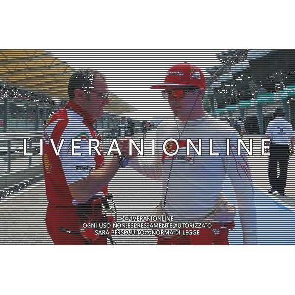 (L to R): Stefano Domenicali (ITA) Ferrari General Director with Kimi Raikkonen (FIN) Ferrari on the grid. 30.03.2014. Formula 1 World Championship, Rd 2, Malaysian Grand Prix, Sepang, Malaysia, Sunday. - www.xpbimages.com, EMail: requests@xpbimages.com - copy of publication required for printed pictures. Every used picture is fee-liable. © Copyright: Batchelor / XPB Images ag aldo liverani sas only italy