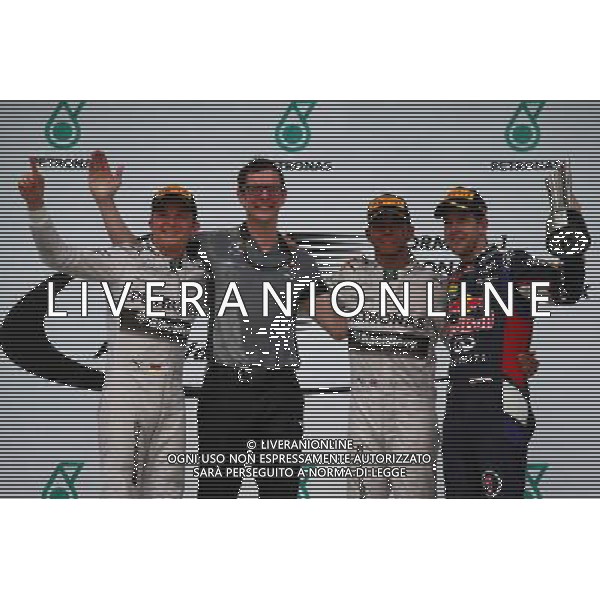 1st place Lewis Hamilton (GBR) Mercedes AMG F1 2nd place Nico Rosberg (GER) Mercedes AMG F1 and 3rd place Sebastian Vettel (GER) Red Bull Racing. 30.03.2014. Formula 1 World Championship, Rd 2, Malaysian Grand Prix, Sepang, Malaysia, Sunday. - www.xpbimages.com, EMail: requests@xpbimages.com - copy of publication required for printed pictures. Every used picture is fee-liable. © Copyright: Batchelor / XPB Images AG ALDO LIVERANI SAS ONLY ITALY