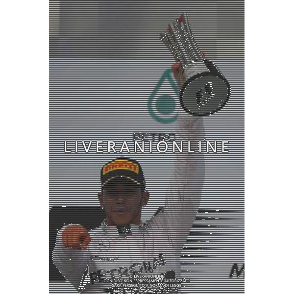 1st place Lewis Hamilton (GBR) Mercedes AMG F1. 30.03.2014. Formula 1 World Championship, Rd 2, Malaysian Grand Prix, Sepang, Malaysia, Sunday. - www.xpbimages.com, EMail: requests@xpbimages.com - copy of publication required for printed pictures. Every used picture is fee-liable. © Copyright: Batchelor / XPB Images AG ALDO LIVERANI SAS ONLY ITALY