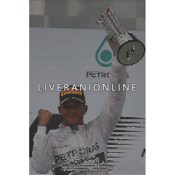 1st place Lewis Hamilton (GBR) Mercedes AMG F1. 30.03.2014. Formula 1 World Championship, Rd 2, Malaysian Grand Prix, Sepang, Malaysia, Sunday. - www.xpbimages.com, EMail: requests@xpbimages.com - copy of publication required for printed pictures. Every used picture is fee-liable. © Copyright: Batchelor / XPB Images AG ALDO LIVERANI SAS ONLY ITALY