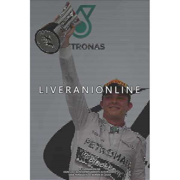 2nd place Nico Rosberg (GER) Mercedes AMG F1. 30.03.2014. Formula 1 World Championship, Rd 2, Malaysian Grand Prix, Sepang, Malaysia, Sunday. - www.xpbimages.com, EMail: requests@xpbimages.com - copy of publication required for printed pictures. Every used picture is fee-liable. © Copyright: Batchelor / XPB Images AG ALDO LIVERANI SAS ONLY ITALY