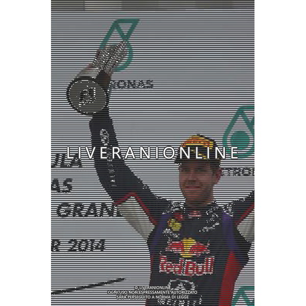 3rd place Sebastian Vettel (GER) Red Bull Racing. 30.03.2014. Formula 1 World Championship, Rd 2, Malaysian Grand Prix, Sepang, Malaysia, Sunday. - www.xpbimages.com, EMail: requests@xpbimages.com - copy of publication required for printed pictures. Every used picture is fee-liable. © Copyright: Batchelor / XPB Images AG ALDO LIVERANI SAS ONLY ITALY