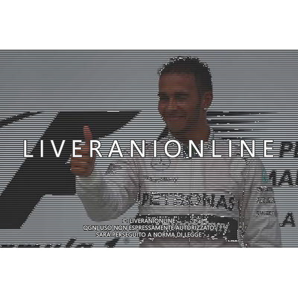 1st place Lewis Hamilton (GBR) Mercedes AMG F1. 30.03.2014. Formula 1 World Championship, Rd 2, Malaysian Grand Prix, Sepang, Malaysia, Sunday. - www.xpbimages.com, EMail: requests@xpbimages.com - copy of publication required for printed pictures. Every used picture is fee-liable. © Copyright: Batchelor / XPB Images AG ALDO LIVERANI SAS ONLY ITALY