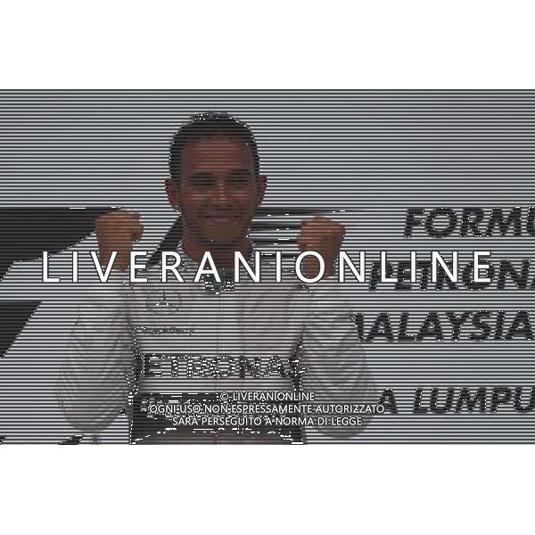 1st place Lewis Hamilton (GBR) Mercedes AMG F1. 30.03.2014. Formula 1 World Championship, Rd 2, Malaysian Grand Prix, Sepang, Malaysia, Sunday. - www.xpbimages.com, EMail: requests@xpbimages.com - copy of publication required for printed pictures. Every used picture is fee-liable. © Copyright: Batchelor / XPB Images AG ALDO LIVERANI SAS ONLY ITALY