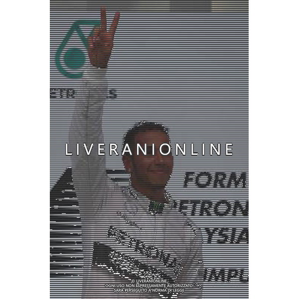 1st place Lewis Hamilton (GBR) Mercedes AMG F1. 30.03.2014. Formula 1 World Championship, Rd 2, Malaysian Grand Prix, Sepang, Malaysia, Sunday. - www.xpbimages.com, EMail: requests@xpbimages.com - copy of publication required for printed pictures. Every used picture is fee-liable. © Copyright: Batchelor / XPB Images AG ALDO LIVERANI SAS ONLY ITALY