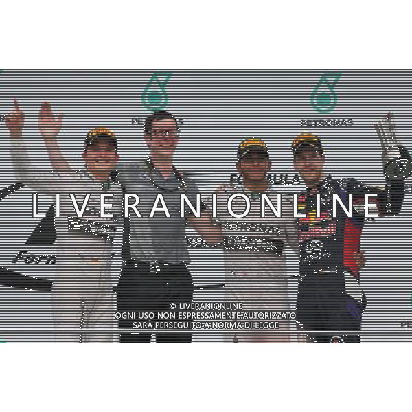 Nico Rosberg (GER), Mercedes AMG F1 Team, Lewis Hamilton (GBR), Mercedes AMG F1 Team and Sebastian Vettel (GER), Red Bull Racing 30.03.2014. Formula 1 World Championship, Rd 2, Malaysian Grand Prix, Sepang, Malaysia, Sunday. - www.xpbimages.com, EMail: requests@xpbimages.com - copy of publication required for printed pictures. Every used picture is fee-liable. © Copyright: Charniaux / XPB Images AG ALDO LIVERANI SAS ONLY ITALY