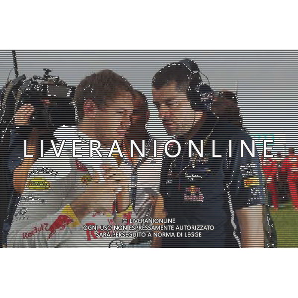 (L to R): Sebastian Vettel (GER) Red Bull Racing with Guillaume Rocquelin (ITA) Red Bull Racing Race Engineer on the grid. 30.03.2014. Formula 1 World Championship, Rd 2, Malaysian Grand Prix, Sepang, Malaysia, Sunday. - www.xpbimages.com, EMail: requests@xpbimages.com - copy of publication required for printed pictures. Every used picture is fee-liable. © Copyright: Photo4 / XPB Images AG ALDO LIVERANI SAS ONLY ITALY