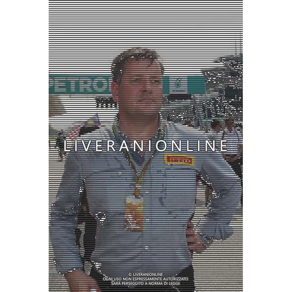 Paul Hembery (GBR) Pirelli Motorsport Director on the grid. 30.03.2014. Formula 1 World Championship, Rd 2, Malaysian Grand Prix, Sepang, Malaysia, Sunday. - www.xpbimages.com, EMail: requests@xpbimages.com - copy of publication required for printed pictures. Every used picture is fee-liable. © Copyright: Photo4 / XPB Images AG ALDO LIVERANI SAS ONLY ITALY