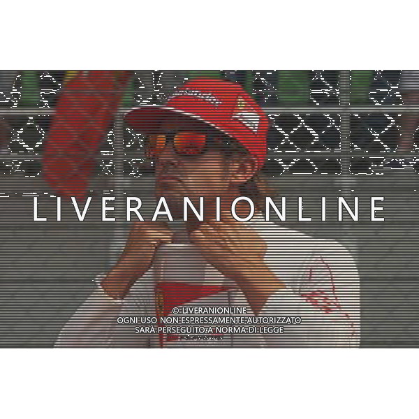 Fernando Alonso (ESP) Ferrari on the grid. 30.03.2014. Formula 1 World Championship, Rd 2, Malaysian Grand Prix, Sepang, Malaysia, Sunday. - www.xpbimages.com, EMail: requests@xpbimages.com - copy of publication required for printed pictures. Every used picture is fee-liable. © Copyright: Photo4 / XPB Images AG ALDO LIVERANI SAS ONLY ITALY