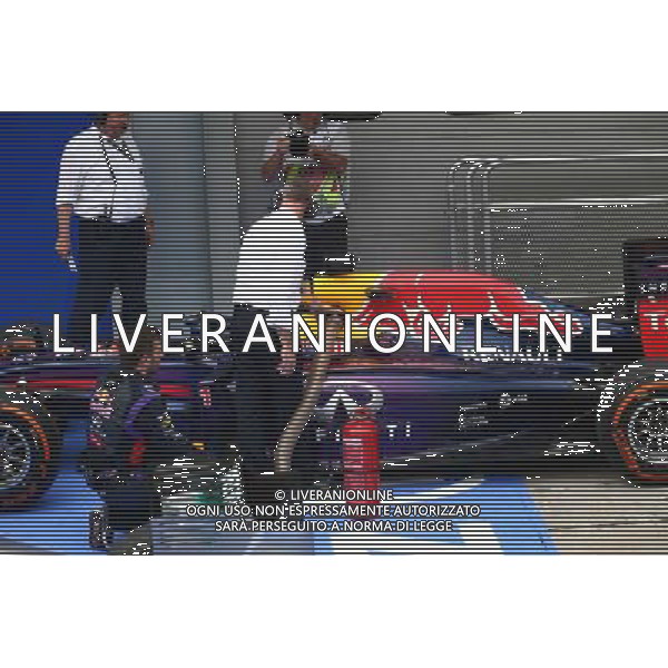 FIA help with the smoking car of Sebastian Vettel (GER) Red Bull Racing. 30.03.2014. Formula 1 World Championship, Rd 2, Malaysian Grand Prix, Sepang, Malaysia, Sunday. - www.xpbimages.com, EMail: requests@xpbimages.com - copy of publication required for printed pictures. Every used picture is fee-liable. © Copyright: Batchelor / XPB Images AG ALDO LIVERANI SAS ONLY ITALY