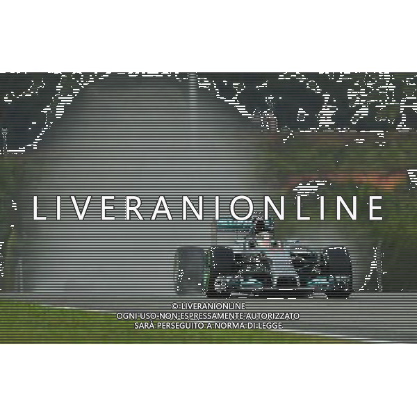 (140329) -- SEPANG, March 29, 2014 () -- Mercedes driver Lewis Hamilton of Great Britain competes during the qualifying session for the Malaysian Formula One Grand Prix at Sepang International Circuit in Sepang, Malaysia, March 29, 2014. (/Chong Voon Chung) AG ALDOL IVERANI SAS ONLY ITALY