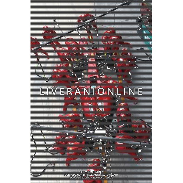 Fernando Alonso (ESP) Ferrari F14-T pit stop. 30.03.2014. Formula 1 World Championship, Rd 2, Malaysian Grand Prix, Sepang, Malaysia, Sunday. - www.xpbimages.com, EMail: requests@xpbimages.com - copy of publication required for printed pictures. Every used picture is fee-liable. Â© Copyright: Batchelor / XPB Images AG ALDO LIVERANI SAS ONLY ITALY