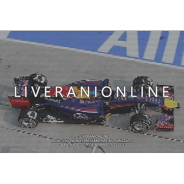 Sebastian Vettel (GER) Red Bull Racing RB10. 30.03.2014. Formula 1 World Championship, Rd 2, Malaysian Grand Prix, Sepang, Malaysia, Sunday. - www.xpbimages.com, EMail: requests@xpbimages.com - copy of publication required for printed pictures. Every used picture is fee-liable. Â© Copyright: Batchelor / XPB Images AG ALDO LIVERANI SAS ONLY ITALY