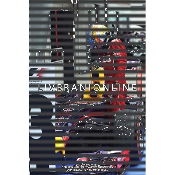 Fernando Alonso (ESP) Ferrari looks at the Red Bull Racing RB10 of Sebastian Vettel (GER) Red Bull Racing in parc ferme. 30.03.2014. Formula 1 World Championship, Rd 2, Malaysian Grand Prix, Sepang, Malaysia, Sunday. - www.xpbimages.com, EMail: requests@xpbimages.com - copy of publication required for printed pictures. Every used picture is fee-liable. Â© Copyright: Photo4 / XPB Images AG ALDO LIVERANI SAS ONLY ITALY