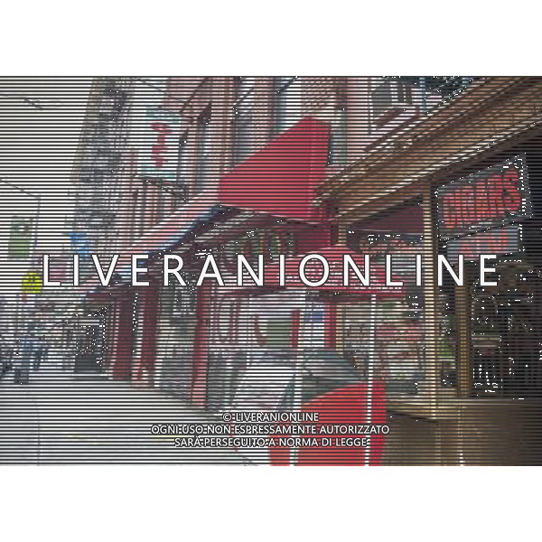 The now closed VIP Gift Shop on Mulberry Street in the Little Italy neighborhood of New York on Sunday, March 30, 2014. Changing demographics and sharp rent increases have decimated the Little Italy neighborhood reducing the once thriving Italian enclave from a fifty-block area into a short three blocks mostly populated by tourist oriented businesses. Eight restaurants have closed in the past year as their leases came up and negotiations with landlords were fruitless. As Chinatown moves north many Italian businesses had been displaced by businesses catering to their Asian customers. ©photoshot/AGENZIA ALDO LIVERANI SAS - ITALY ONLY - Vedute della citta\' di New York - Vita quotidiana