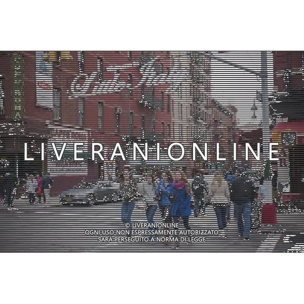 Restaurants and businesses along Mulberry Street in the Little Italy neighborhood of New York on Sunday, March 30, 2014. Changing demographics and sharp rent increases have decimated the Little Italy neighborhood reducing the once thriving Italian enclave from a fifty-block area into a short three blocks mostly populated by tourist oriented businesses. Eight restaurants have closed in the past year as their leases came up and negotiations with landlords were fruitless. As Chinatown moves north many Italian businesses had been displaced by businesses catering to their Asian customers. ©photoshot/AGENZIA ALDO LIVERANI SAS - ITALY ONLY - Vedute della citta\' di New York - Vita quotidiana