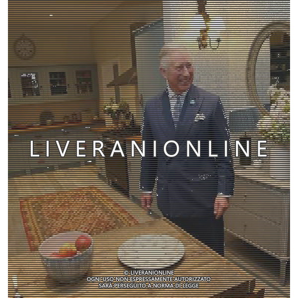 LONDON, ENGLAND - MARCH 26: The Prince of Wales is taken around an \'Eco\' House as he makes an official visit to Prince\'s Crescent at The Ideal Home Show at Earls Court on March 26, 2014 in London, England. The Prince visited three \'Eco\' Houses put together by the Prince\'s Foundation for the Built Environment. ©PHOTOSHOT/AGENZIA ALDO LIVERANI SAS - ITALY ONLY - EDITORIAL USE ONLY - REALI INGLESI: Il Principe Carlo d\'inghilterra in visita ufficiale al The Ideal Home Show al Earls Court 26 marzo 2014 a Londra