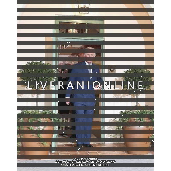 LONDON, ENGLAND - MARCH 26: The Prince of Wales is taken around an \'Eco\' House as he makes an official visit to Prince\'s Crescent at The Ideal Home Show at Earls Court on March 26, 2014 in London, England. The Prince visited three \'Eco\' Houses put together by the Prince\'s Foundation for the Built Environment. ©PHOTOSHOT/AGENZIA ALDO LIVERANI SAS - ITALY ONLY - EDITORIAL USE ONLY - REALI INGLESI: Il Principe Carlo d\'inghilterra in visita ufficiale al The Ideal Home Show al Earls Court 26 marzo 2014 a Londra