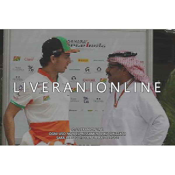 (L to R): Sergio Perez (MEX) Sahara Force India F1 with Muhammed Al Khalifa (BRN) Bahrain Circuit Chairman. 03.04.2014. Formula 1 World Championship, Rd 3, Bahrain Grand Prix, Sakhir, Bahrain, Preparation Day. - www.xpbimages.com, EMail: requests@xpbimages.com - copy of publication required for printed pictures. Every used picture is fee-liable. © Copyright: Moy / XPB Images AG ALDO LIVERANI SAS ONLY ITALY