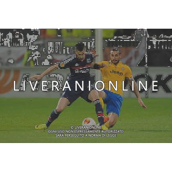 Maxime GONALONS / Martin CACERES - 03.02.2014 - Lyon / Juventus Turin - 1/4Finale Aller Ligue Europa Photo : Jean Paul Thomas / Icon Sport /AGENZIA ALDO LIVERANI SAS - ITALY ONLY - EDITORIAL USE ONLY - LIONE Vs JUVENTUS ANDATA QUARTI DI FINALE UEFA EUROPA LEAGUE 03 MARZO 2014