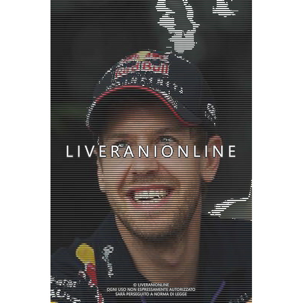 Sebastian Vettel (GER) Red Bull Racing. 03.04.2014. Formula 1 World Championship, Rd 3, Bahrain Grand Prix, Sakhir, Bahrain, Preparation Day. - www.xpbimages.com, EMail: requests@xpbimages.com - copy of publication required for printed pictures. Every used picture is fee-liable. © Copyright: Moy / XPB Images AG ALDO LIVERANI SAS ONLY ITALY
