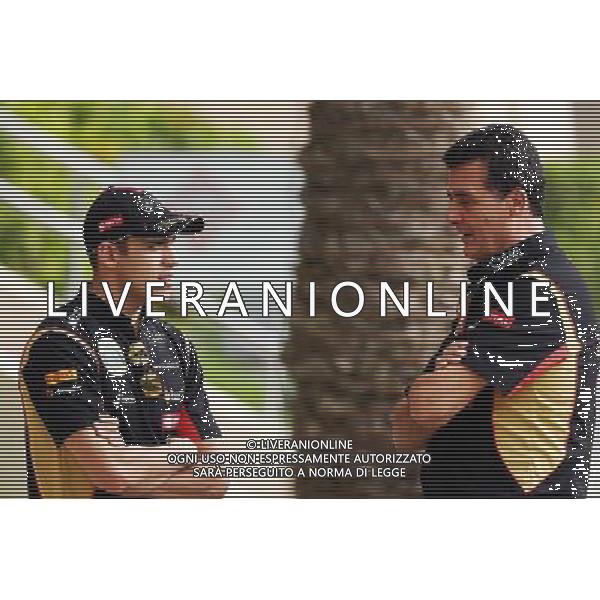 (L to R): Pastor Maldonado (VEN) Lotus F1 Team with Federico Gastaldi (ARG) Lotus F1 Team Deputy Team Principal. 03.04.2014. Formula 1 World Championship, Rd 3, Bahrain Grand Prix, Sakhir, Bahrain, Preparation Day. - www.xpbimages.com, EMail: requests@xpbimages.com - copy of publication required for printed pictures. Every used picture is fee-liable. © Copyright: Batchelor / XPB Images AG ALDO LIVERANI SAS ONLY ITALY
