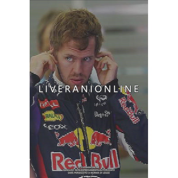 Sebastian Vettel (GER) Red Bull Racing. 04.04.2014. Formula 1 World Championship, Rd 3, Bahrain Grand Prix, Sakhir, Bahrain, Practice Day - www.xpbimages.com, EMail: requests@xpbimages.com - copy of publication required for printed pictures. Every used picture is fee-liable. © Copyright: Batchelor / XPB Images AG ALDO LIVERANI SAS ONLY ITALY