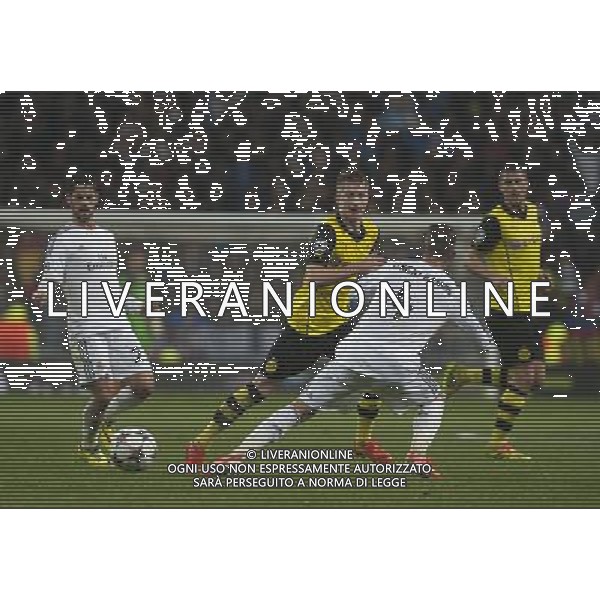 (140403) -- MADRID, April 3, 2014 () -- Dortmund\'s Marco Reus (2nd L) vies for the ball during the UEFA Champions League quarter-final first leg match against Real Madrid at Santiago Bernabeu stadium in Madrid, Spain, April 2, 2014. Real Madrid won the match by 3-0. (/Xie Haining) ©PHOTOSHOT/AGENZIA ALDO LIVERANI SAS - ITALY ONLY - EDITORIAL USE ONLY