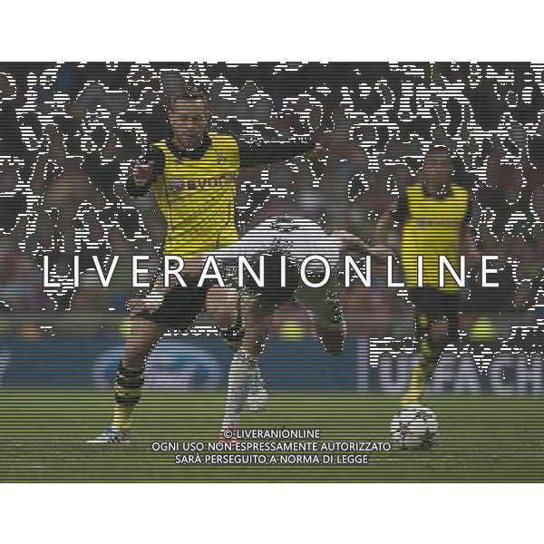 (140403) -- MADRID, April 3, 2014 () -- Dortmund\'s Julian Schieber (L) vies with Real Madrid\'s Pepe during their UEFA Champions League quarter-final first leg match at Santiago Bernabeu stadium in Madrid, Spain, April 2, 2014. Real Madrid won the match by 3-0. (/Xie Haining) ©PHOTOSHOT/AGENZIA ALDO LIVERANI SAS - ITALY ONLY - EDITORIAL USE ONLY