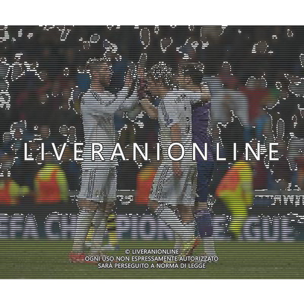 (140403) -- MADRID, April 3, 2014 () -- (From R to L)Real Madrid\'s Iker Casillas, Fabio Coentrao and Sergio Ramos celebrate victory over Dortmund after the UEFA Champions League quarter-final first leg match at Santiago Bernabeu stadium in Madrid, Spain, April 2, 2014. Real Madrid won the match by 3-0. (/Xie Haining) ©PHOTOSHOT/AGENZIA ALDO LIVERANI SAS - ITALY ONLY - EDITORIAL USE ONLY