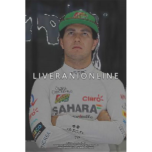 Sergio Perez (MEX) Sahara Force India F1. 04.04.2014. Formula 1 World Championship, Rd 3, Bahrain Grand Prix, Sakhir, Bahrain, Practice Day - www.xpbimages.com, EMail: requests@xpbimages.com - copy of publication required for printed pictures. Every used picture is fee-liable. © Copyright: Moy / XPB Images AG ALDO LIVERANI SAS ONLY ITALY