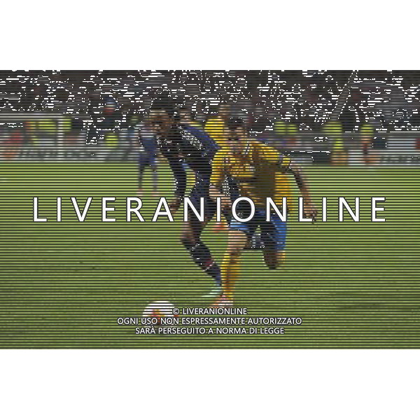 Bakary KONE / Sebastian GIOVINCO - 03.02.2014 - Lyon / Juventus Turin - 1/4Finale Aller Ligue Europa Photo : Jean Paul Thomas / Icon Sport *** Local Caption *** AG ALDOLIVERANI SAS ONLYITALY *** Local Caption ***