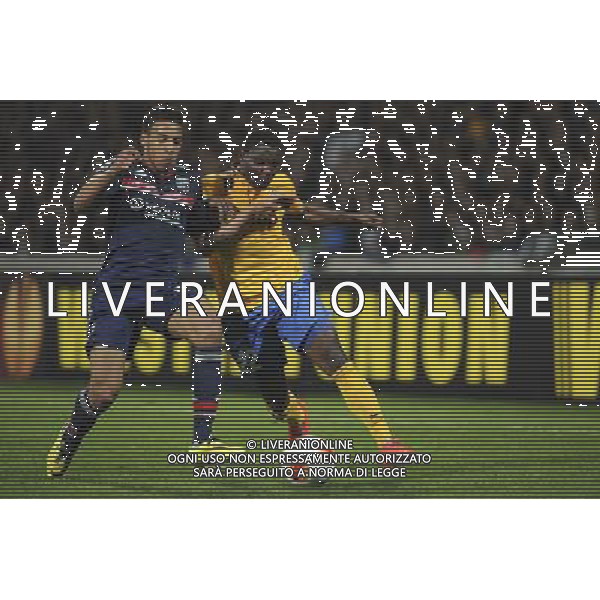 Corentin TOLISSO / Kwadwo Asamoah - 03.02.2014 - Lyon / Juventus Turin - 1/4Finale Aller Ligue Europa Photo : Jean Paul Thomas / Icon Sport *** Local Caption *** AG ALDOLIVERANI SAS ONLYITALY *** Local Caption ***