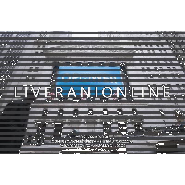 A banner graces the front of the New York Stock Exchange for the debut of the initial public offering for Opower on Friday, April 4, 2014. The company assists utility companies around the world to reduce energy consumption, lower costs and minimize carbon emissions. ©photoshot/AGENZIA ALDO LIVERANI SAS - ITALY ONLY - EDITORIAL USE ONLY