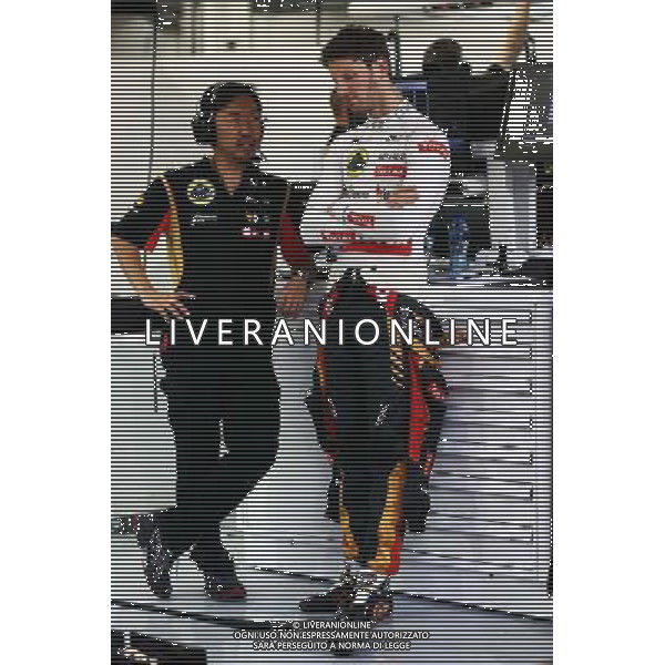 Romain Grosjean (FRA) Lotus F1 Team with Ayao Komatsu (JPN) Lotus F1 Team Race Engineer. 04.04.2014. Formula 1 World Championship, Rd 3, Bahrain Grand Prix, Sakhir, Bahrain, Practice Day - www.xpbimages.com, EMail: requests@xpbimages.com - copy of publication required for printed pictures. Every used picture is fee-liable. © Copyright: Batchelor / XPB Images AG ALDO LIVERANI SAS ONLY ITALY