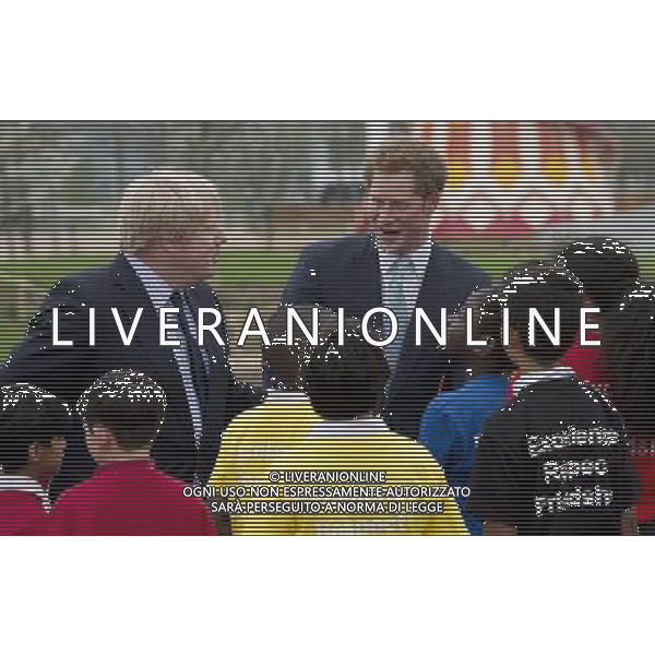 Prince Harry with the Mayor of London, Boris Johnson and local school children from Gainsborough Primary school in Newham at the new Queen Elizabeth Olympic Park. The park will open to the public on Saturday 5th April. 14 ©photoshot/AGENZIA ALDO LIVERANI SAS - ITALY ONLY - EDITORIAL USE ONLY - REALI INGLESI: Il principe Harry d\'inghilterra con i bambini delle scuole locali da Gainsborough a Newham presso il nuovo Parco Olimpico Queen Elizabeth, con il sindaco di Londra, Boris Johnson