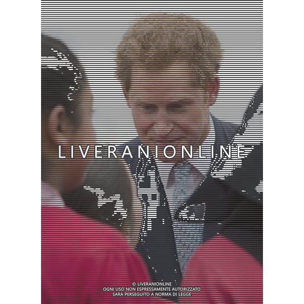 Prince Harry talking to local school children from Gainsborough Primary school in Newham at the new Queen Elizabeth Olympic Park, with the Mayor of London, Boris Johnson. The park will open to the public on Saturday 5th April. 14 ©photoshot/AGENZIA ALDO LIVERANI SAS - ITALY ONLY - EDITORIAL USE ONLY - REALI INGLESI: Il principe Harry d\'inghilterra con i bambini delle scuole locali da Gainsborough a Newham presso il nuovo Parco Olimpico Queen Elizabeth, con il sindaco di Londra, Boris Johnson