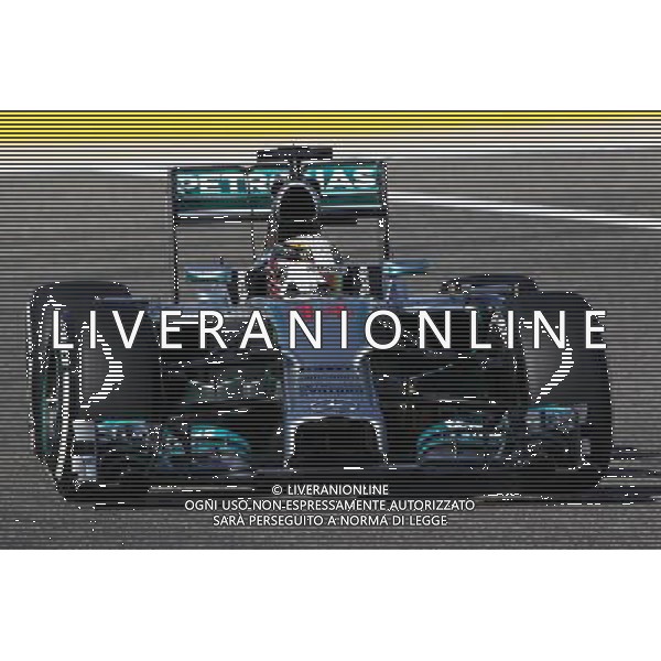 Lewis Hamilton (GBR) Mercedes AMG F1 W05. 05.04.2014. Formula 1 World Championship, Rd 3, Bahrain Grand Prix, Sakhir, Bahrain, Qualifying Day. - www.xpbimages.com, EMail: requests@xpbimages.com - copy of publication required for printed pictures. Every used picture is fee-liable. © Copyright: Moy / XPB Images AG ALDO LIVERANI SAS ONLY ITALY
