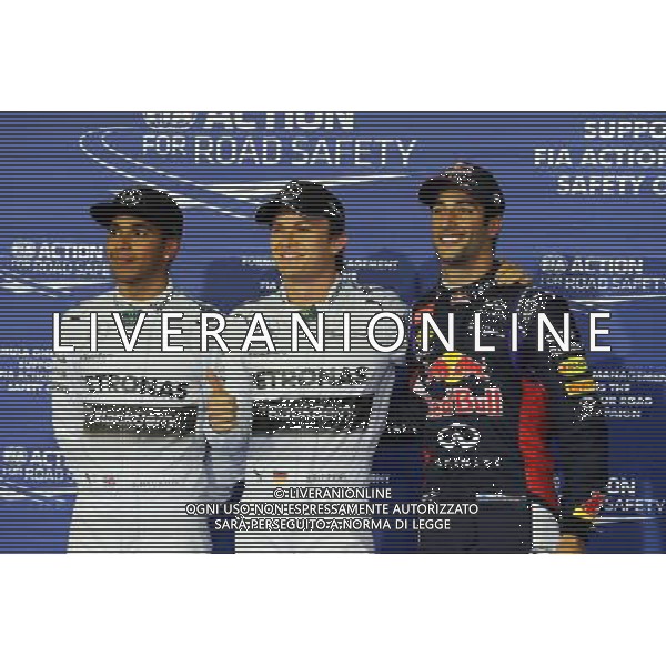 Qualifying top three in parc ferme (L to R): Lewis Hamilton (GBR) Mercedes AMG F1, second; Nico Rosberg (GER) Mercedes AMG F1, pole position; Daniel Ricciardo (AUS) Red Bull Racing, third. 05.04.2014. Formula 1 World Championship, Rd 3, Bahrain Grand Prix, Sakhir, Bahrain, Qualifying Day. - www.xpbimages.com, EMail: requests@xpbimages.com - copy of publication required for printed pictures. Every used picture is fee-liable. © Copyright: Moy / XPB Images AG ALDO LIVERANI SAS ONLY ITALY