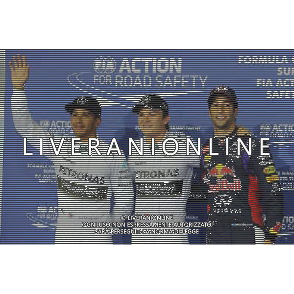 Qualifying top three in parc ferme (L to R): Lewis Hamilton (GBR) Mercedes AMG F1, second; Nico Rosberg (GER) Mercedes AMG F1, pole position; Daniel Ricciardo (AUS) Red Bull Racing, third. 05.04.2014. Formula 1 World Championship, Rd 3, Bahrain Grand Prix, Sakhir, Bahrain, Qualifying Day. - www.xpbimages.com, EMail: requests@xpbimages.com - copy of publication required for printed pictures. Every used picture is fee-liable. © Copyright: Moy / XPB Images AG ALDO LIVERANI SAS ONLY ITALY