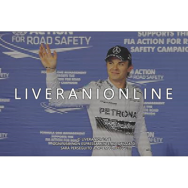 Nico Rosberg (GER) Mercedes AMG F1 W05 celebrates his pole position in parc ferme. 05.04.2014. Formula 1 World Championship, Rd 3, Bahrain Grand Prix, Sakhir, Bahrain, Qualifying Day. - www.xpbimages.com, EMail: requests@xpbimages.com - copy of publication required for printed pictures. Every used picture is fee-liable. © Copyright: Moy / XPB Images AG ALDO LIVERANI SAS ONLY ITALY