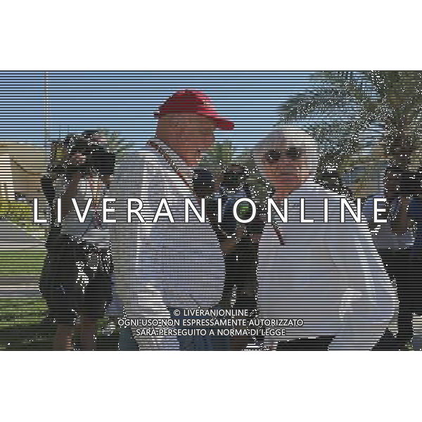 (L to R): Niki Lauda (AUT) Mercedes Non-Executive Chairman with Bernie Ecclestone (GBR). 06.04.2014. Formula 1 World Championship, Rd 3, Bahrain Grand Prix, Sakhir, Bahrain, Race Day. - www.xpbimages.com, EMail: requests@xpbimages.com - copy of publication required for printed pictures. Every used picture is fee-liable. © Copyright: Moy / XPB Images AG ALDO LIVERANI SAS ONLY ITALY