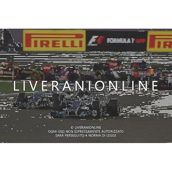 Lewis Hamilton (GBR) Mercedes AMG F1 W05 leads team mate Nico Rosberg (GER) Mercedes AMG F1 W05 at the start of the race. 06.04.2014. Formula 1 World Championship, Rd 3, Bahrain Grand Prix, Sakhir, Bahrain, Race Day. - www.xpbimages.com, EMail: requests@xpbimages.com - copy of publication required for printed pictures. Every used picture is fee-liable. © Copyright: Batchelor / XPB Images AG ALDO LIVERANI SAS ONLY ITALY