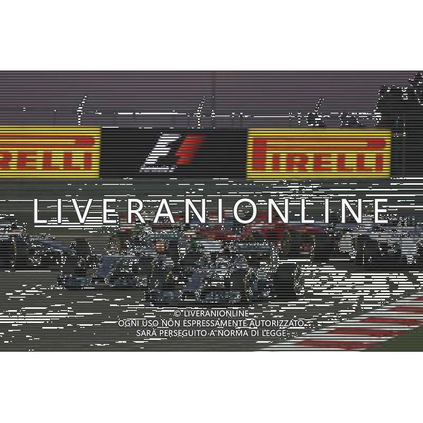 Lewis Hamilton (GBR) Mercedes AMG F1 W05 leads Nico Rosberg (GER) Mercedes AMG F1 W05 at the start of the race. 06.04.2014. Formula 1 World Championship, Rd 3, Bahrain Grand Prix, Sakhir, Bahrain, Race Day. - www.xpbimages.com, EMail: requests@xpbimages.com - copy of publication required for printed pictures. Every used picture is fee-liable. © Copyright: Moy / XPB Images AG ALDO LIVERANI SAS ONLY ITALY