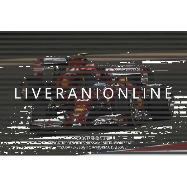 Fernando Alonso (ESP) Ferrari F14-T leads team mate Kimi Raikkonen (FIN) Ferrari F14-T. 06.04.2014. Formula 1 World Championship, Rd 3, Bahrain Grand Prix, Sakhir, Bahrain, Race Day. - www.xpbimages.com, EMail: requests@xpbimages.com - copy of publication required for printed pictures. Every used picture is fee-liable. © Copyright: Moy / XPB Images AG ALDO LIVERANI SAS ONLY ITALY 