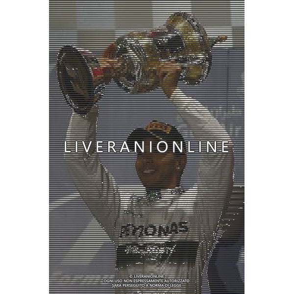1st place Lewis Hamilton (GBR) Mercedes AMG F1. 06.04.2014. Formula 1 World Championship, Rd 3, Bahrain Grand Prix, Sakhir, Bahrain, Race Day. - www.xpbimages.com, EMail: requests@xpbimages.com - copy of publication required for printed pictures. Every used picture is fee-liable. © Copyright: Batchelor / XPB Images /Agenzia Aldo Liverani sas - ITALY ONLY - EDITORIAL USE ONLY
