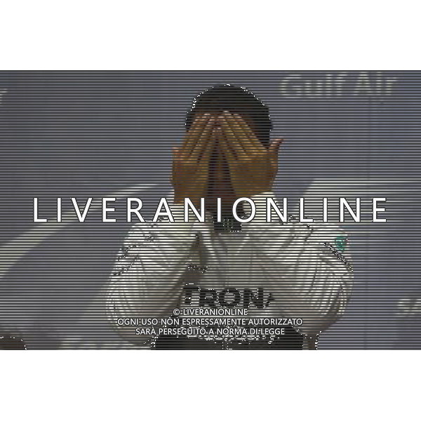 1st place Lewis Hamilton (GBR) Mercedes AMG F1. 06.04.2014. Formula 1 World Championship, Rd 3, Bahrain Grand Prix, Sakhir, Bahrain, Race Day. - www.xpbimages.com, EMail: requests@xpbimages.com - copy of publication required for printed pictures. Every used picture is fee-liable. © Copyright: Batchelor / XPB Images /Agenzia Aldo Liverani sas - ITALY ONLY - EDITORIAL USE ONLY