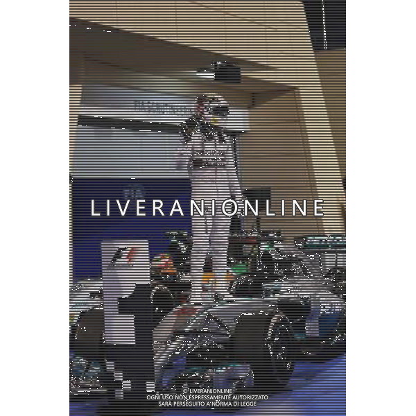 Race winner Lewis Hamilton (GBR) Mercedes AMG F1 W05 celebrates in parc ferme. 06.04.2014. Formula 1 World Championship, Rd 3, Bahrain Grand Prix, Sakhir, Bahrain, Race Day. - www.xpbimages.com, EMail: requests@xpbimages.com - copy of publication required for printed pictures. Every used picture is fee-liable. © Copyright: Moy / XPB Images AG ALDO LIVERANI SAS ONLY ITALY