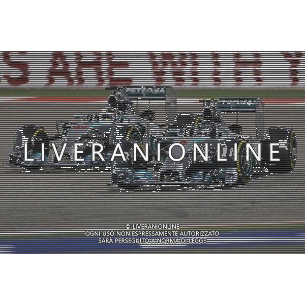 Lewis Hamilton (GBR), Mercedes AMG F1 Team and Nico Rosberg (GER), Mercedes AMG F1 Team 06.04.2014. Formula 1 World Championship, Rd 3, Bahrain Grand Prix, Sakhir, Bahrain, Race Day. - www.xpbimages.com, EMail: requests@xpbimages.com - copy of publication required for printed pictures. Every used picture is fee-liable. © Copyright: Charniaux / XPB Images AG ALDO LIVERANI SAS ONLY ITALY