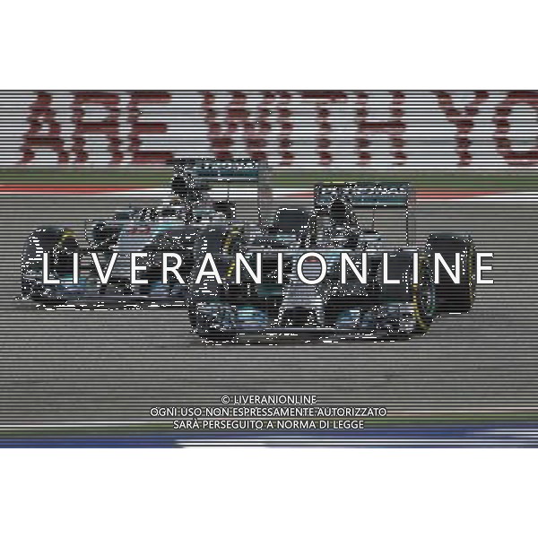 Lewis Hamilton (GBR), Mercedes AMG F1 Team and Nico Rosberg (GER), Mercedes AMG F1 Team 06.04.2014. Formula 1 World Championship, Rd 3, Bahrain Grand Prix, Sakhir, Bahrain, Race Day. - www.xpbimages.com, EMail: requests@xpbimages.com - copy of publication required for printed pictures. Every used picture is fee-liable. © Copyright: Charniaux / XPB Images AG ALDO LIVERANI SAS ONLY ITALY